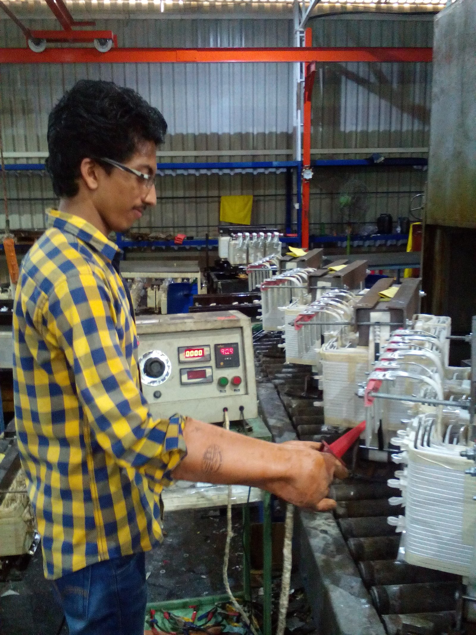 Electrical engineer testing a high-voltage transformer