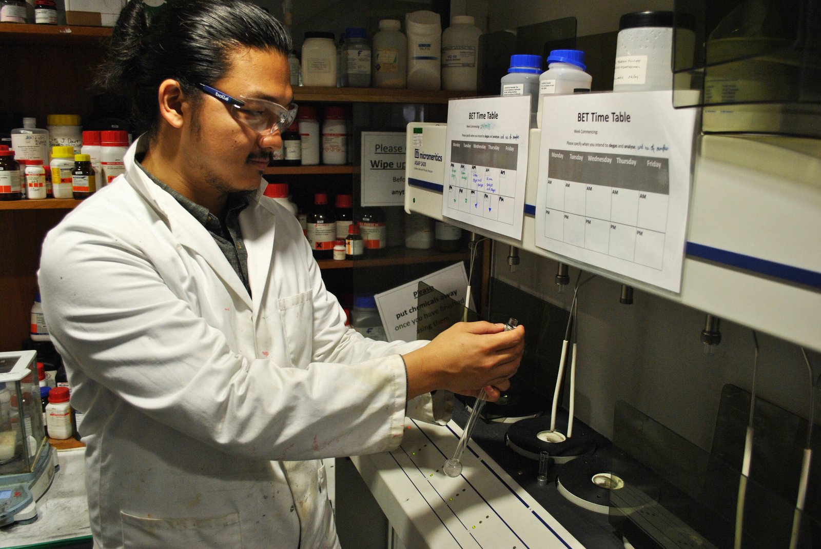 PhD student conducting chemistry research in a laboratory