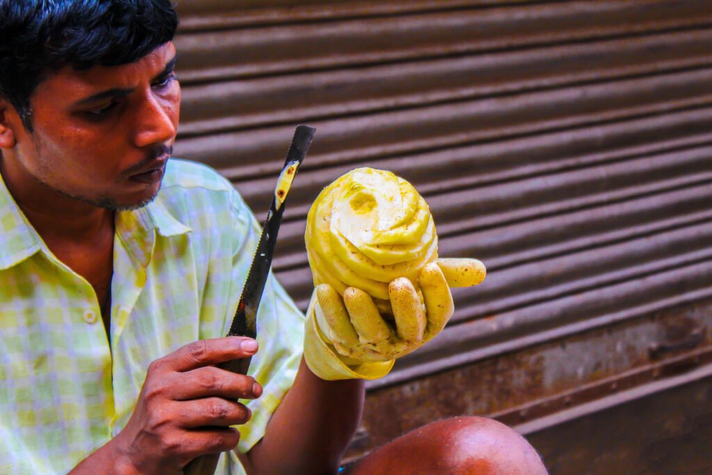 Indian street worker at work