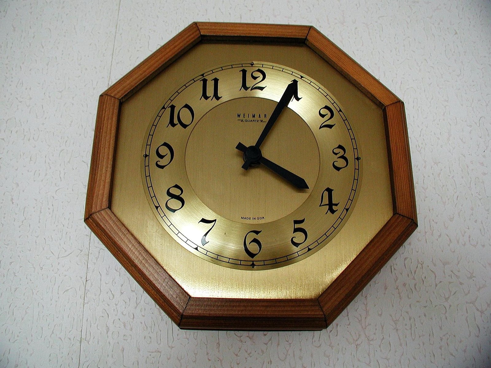 Analog wall clock illustrating timestamp-based age calculation
