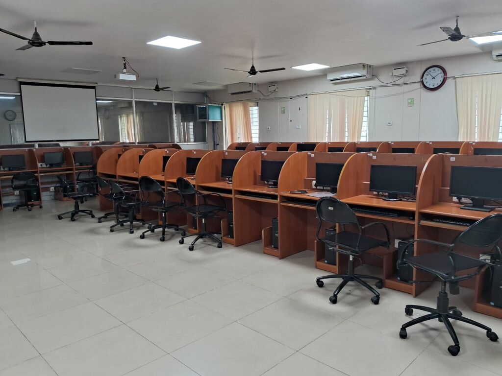 Computer laboratory in India representing a computer-based recruitment examination setting