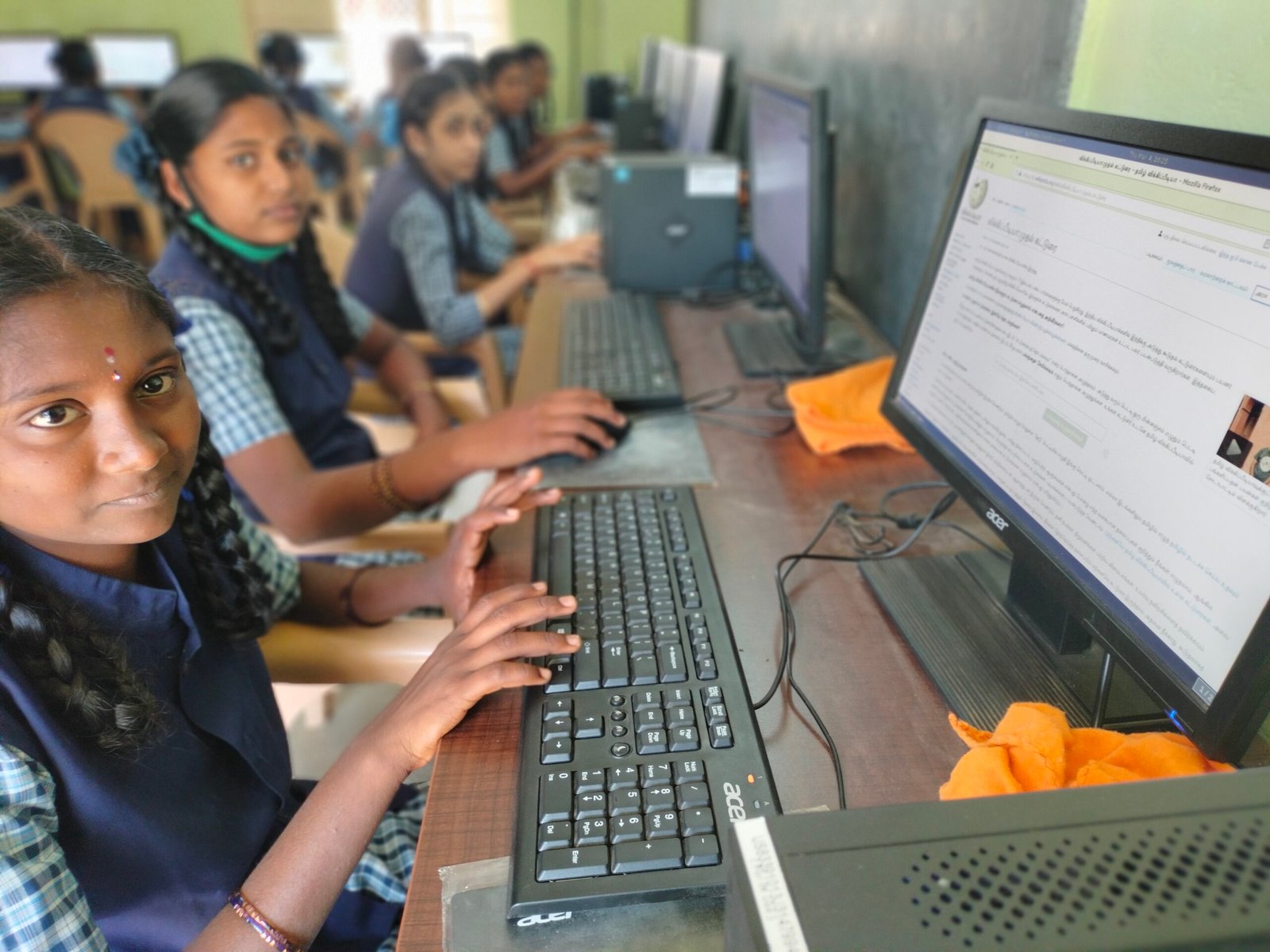 Student working at a computer in a laboratory setting