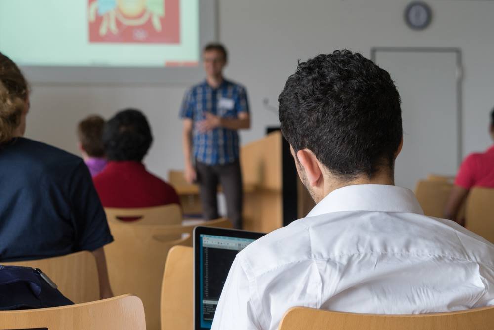 Student attending a lecture in a classroom