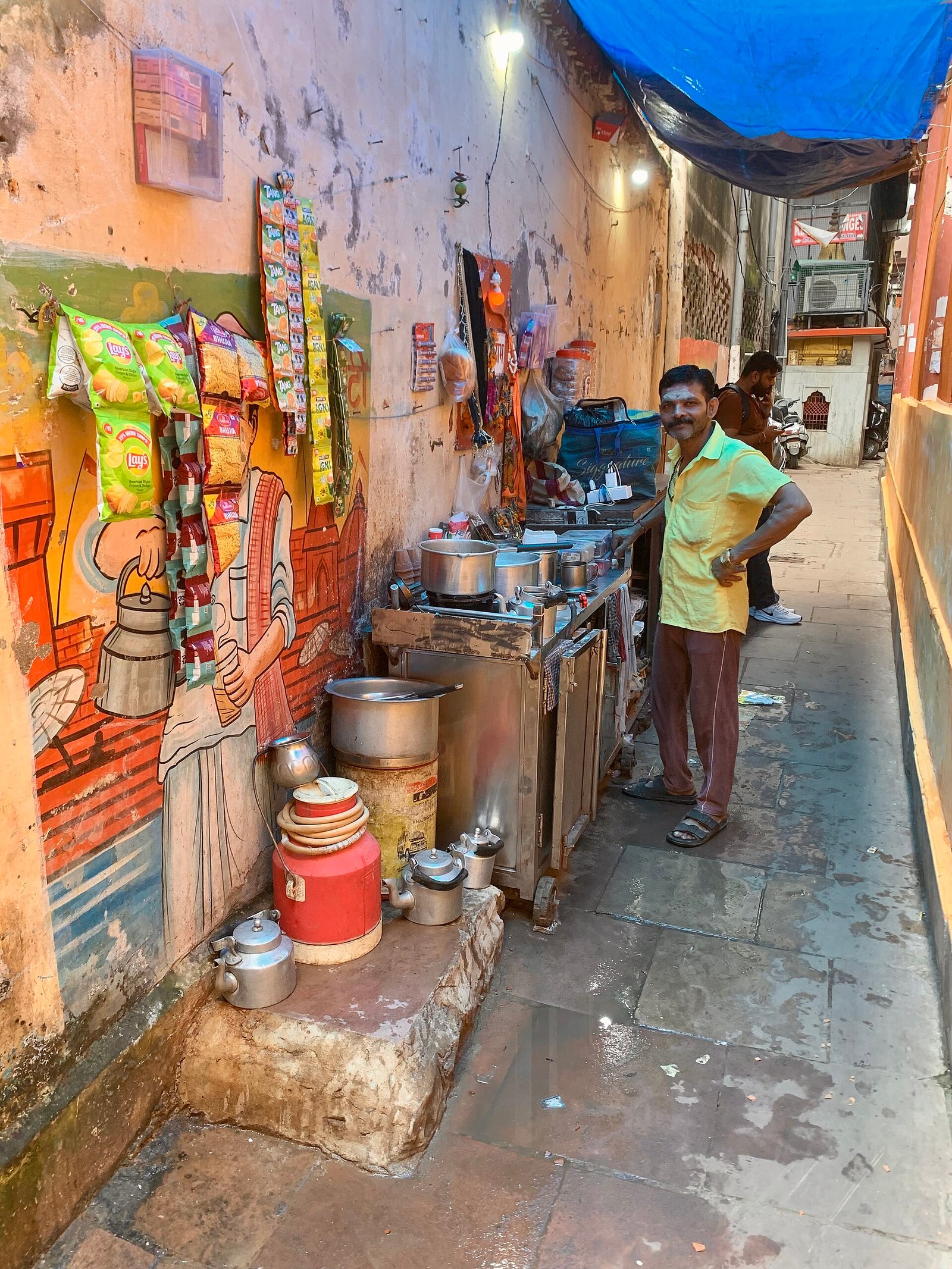 Food vendor operating a street food stall in Varanasi