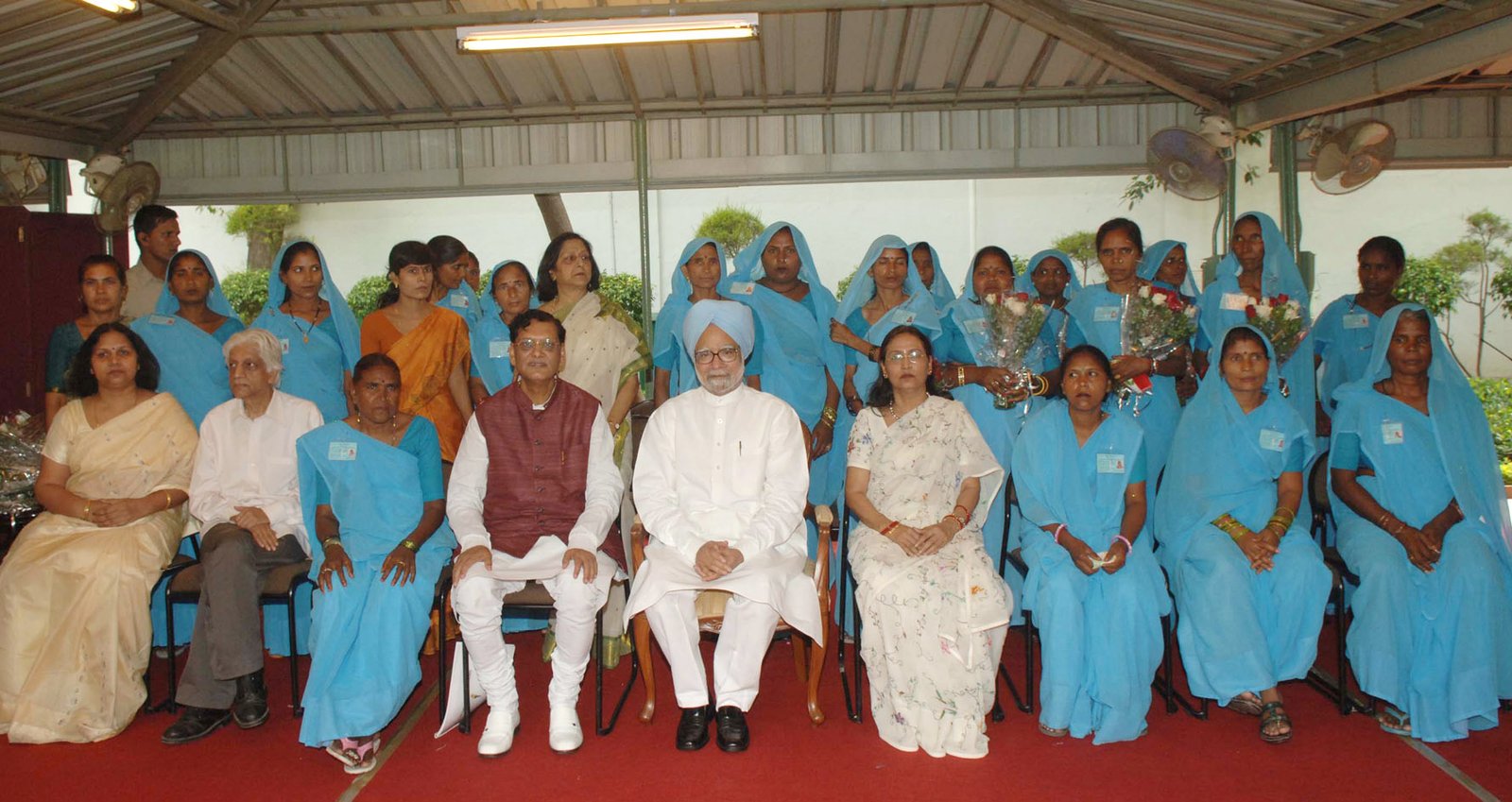 Indian sanitation workers at a public sanitation programme