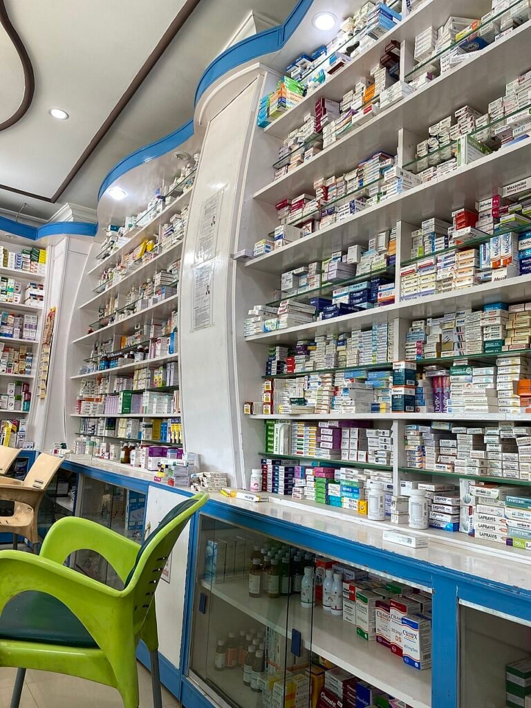 Interior of a retail pharmacy with medicines arranged on shelves