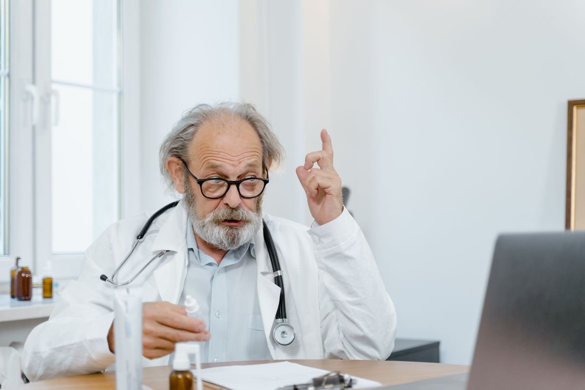 Senior doctor conducting a healthcare consultation