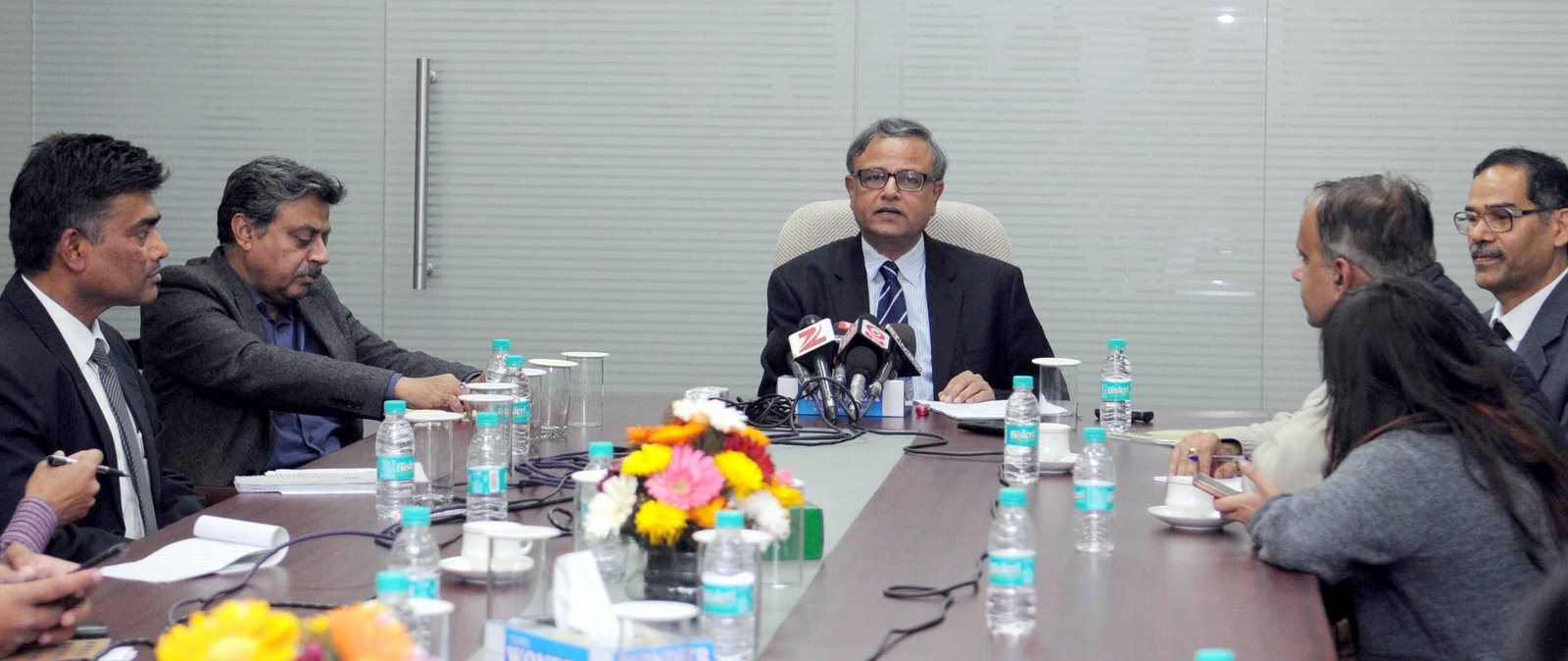 PFRDA Chairman discussing National Pension System developments in New Delhi