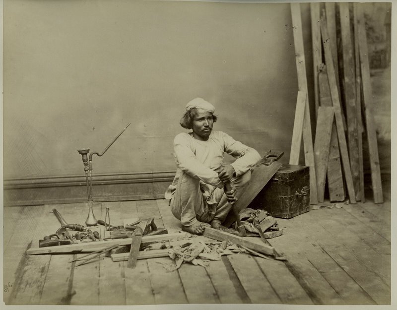 Traditional Indian carpenter at work, illustrating a PM Vishwakarma covered trade