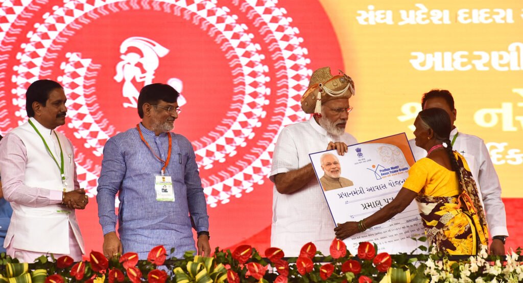 PM Awas Yojana beneficiaries receiving housing sanction letters