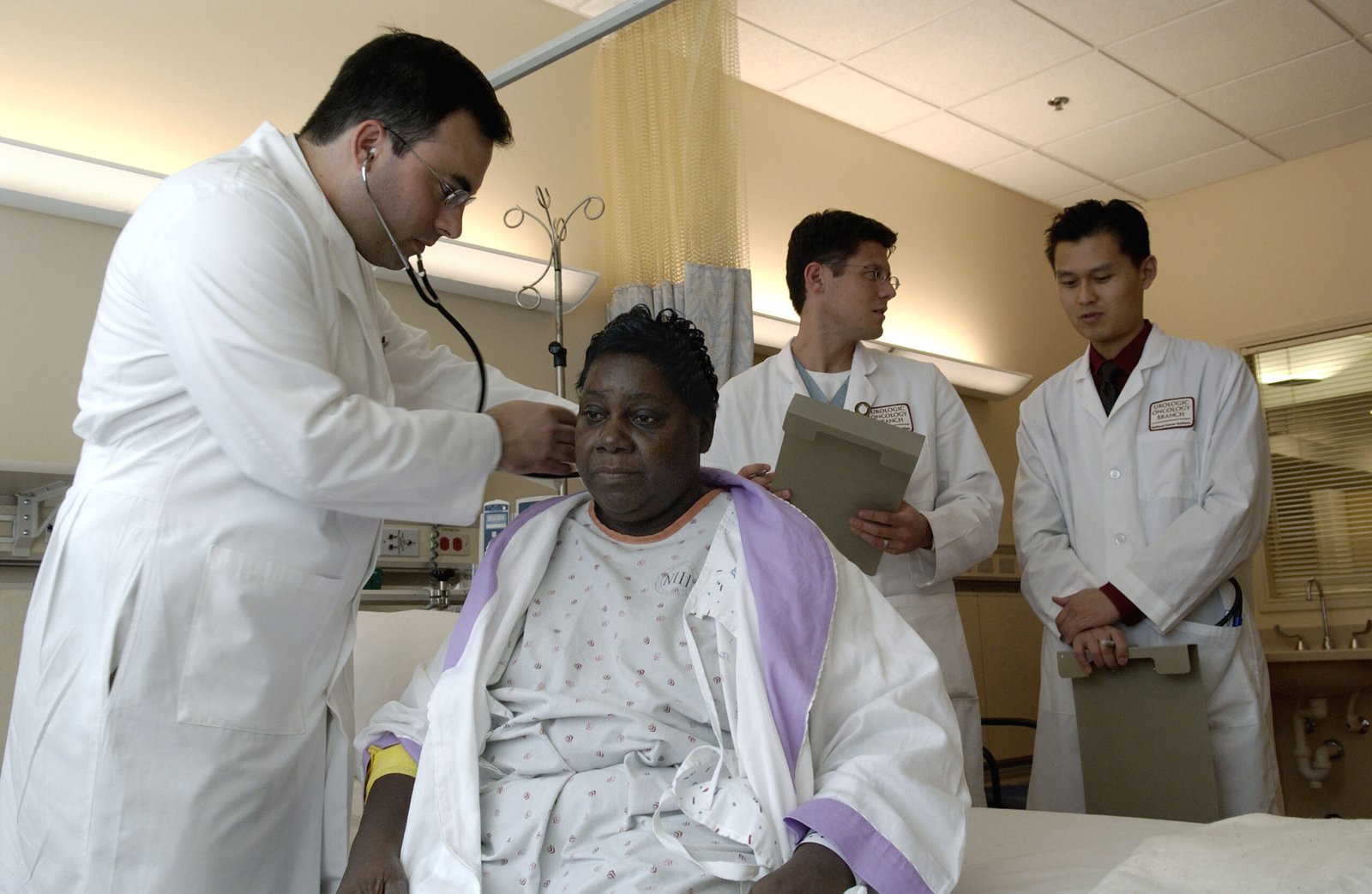 Doctor examining a patient in a hospital setting for UPSC General Medicine recruitment context