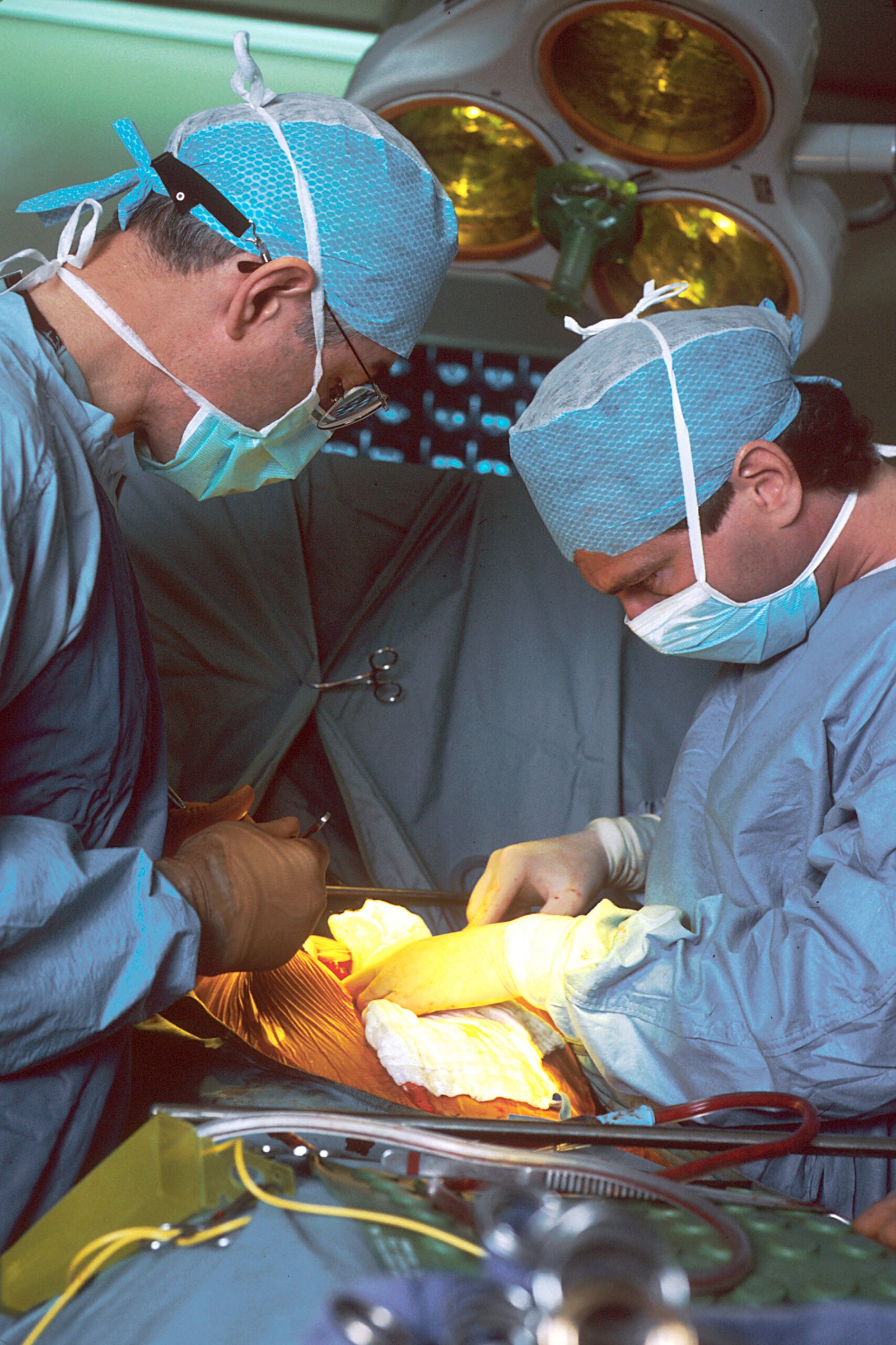 Surgeons working in an operating room during a medical procedure