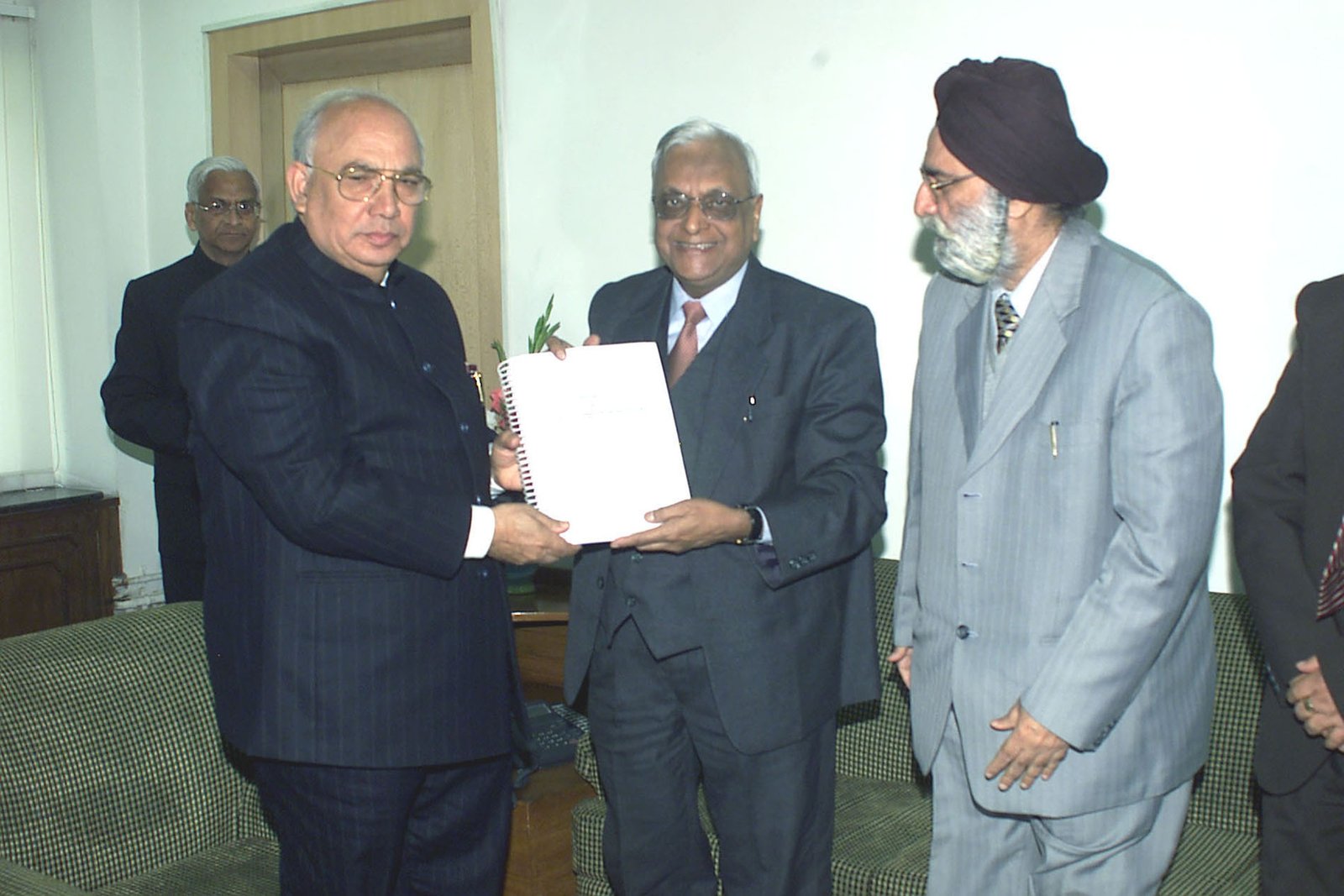 Justice B.P. Saraf submitting a committee report on arbitration in New Delhi