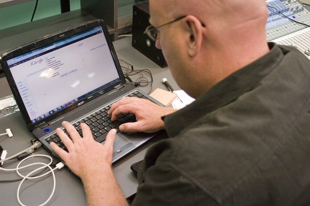 Person searching for information on a laptop